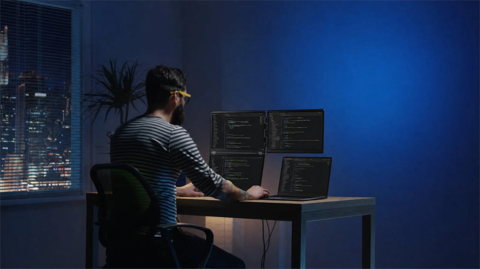 Developer working across code and terminal views on Fold 7